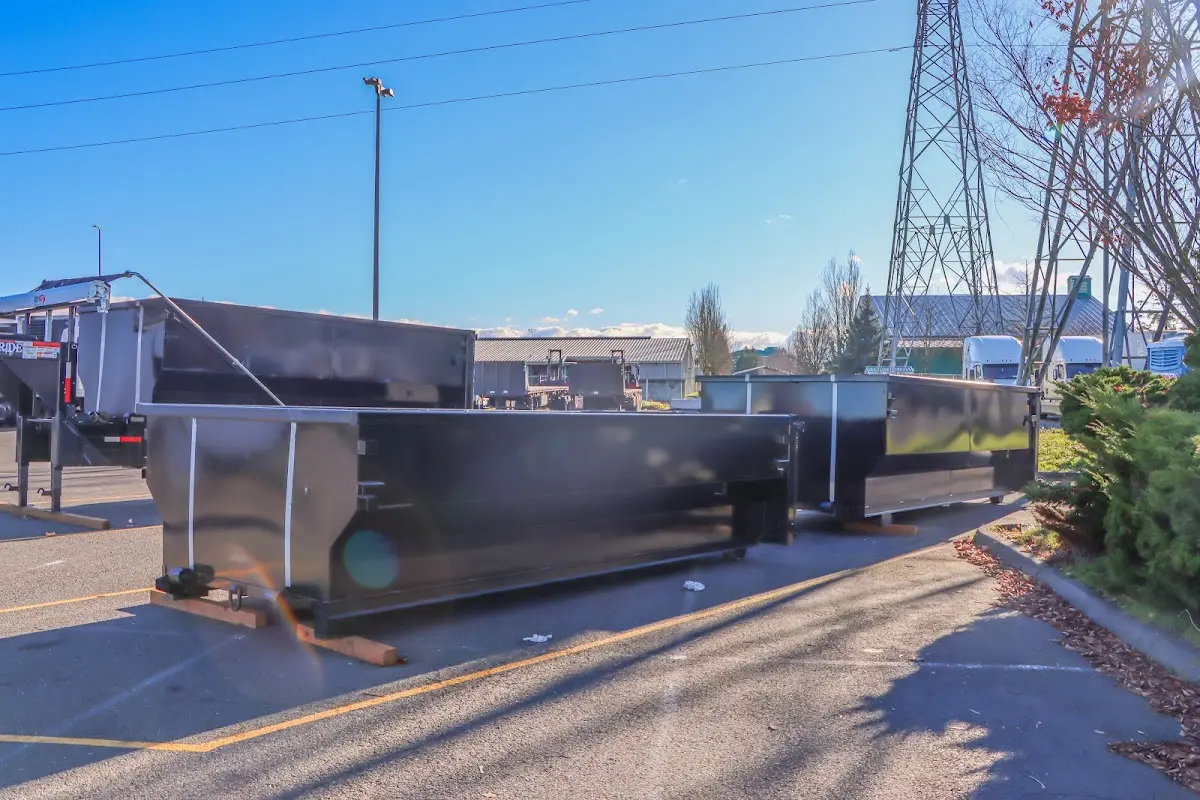 Roll-off dumpster ready for waste disposal at job site for Concrete Dumpster Rental in Yuba City